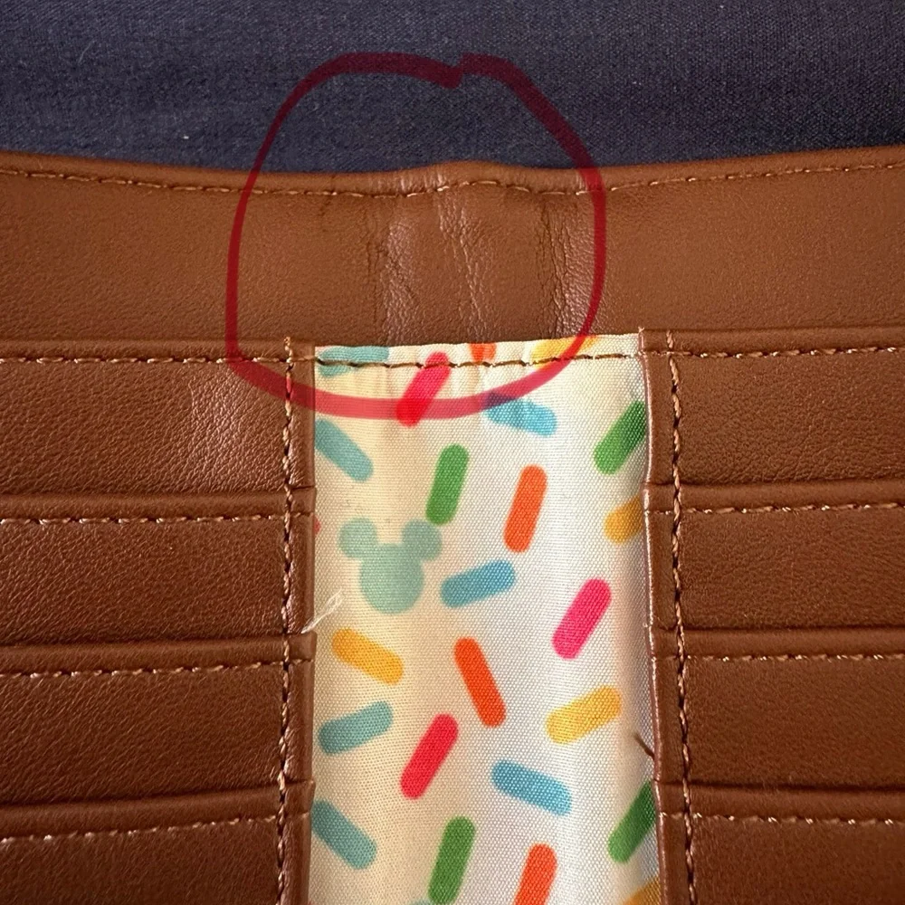 Lounge fly Mickey wallet 
Used
Please see pictures for wear and tear - Picture 5 of 5